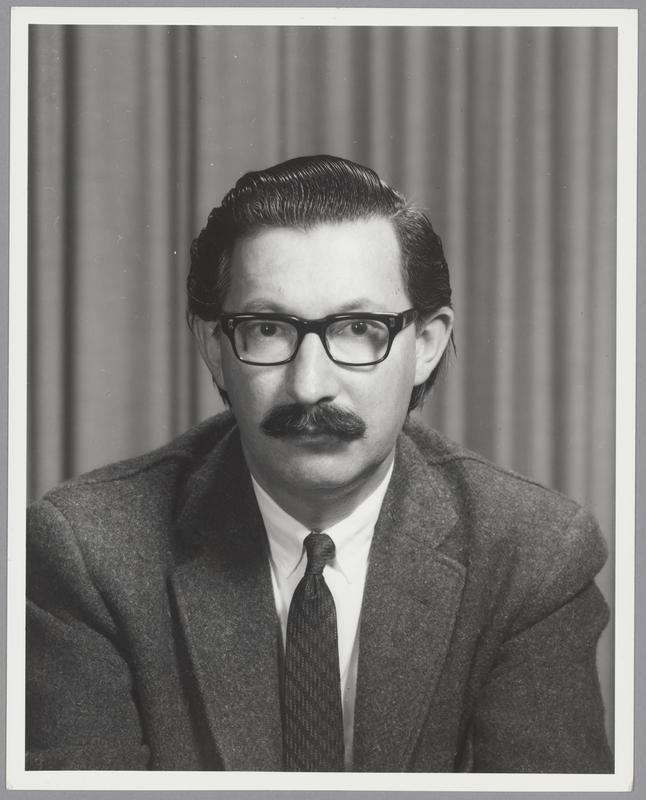 Black and white portrait photograph of Joseph Weizenbaum wearing glasses